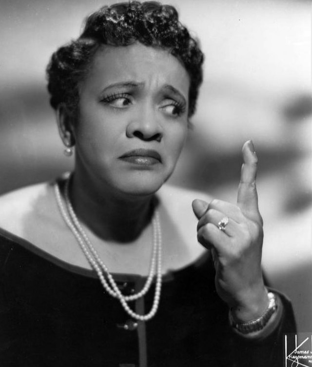 Moms Mabley, pictured in a black-and-white portrait.